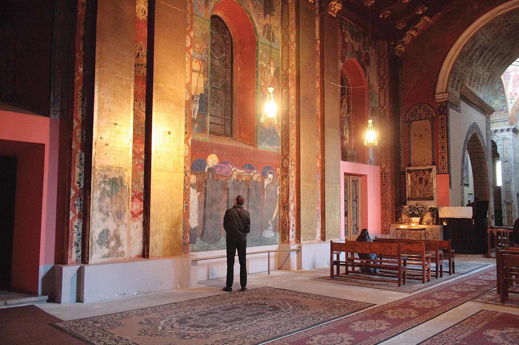 Phil Steger, HMML Deputy Director of Manuscript Preservation (2007–2009), examining frescos in L'viv's 14th century Armenian Cathedral